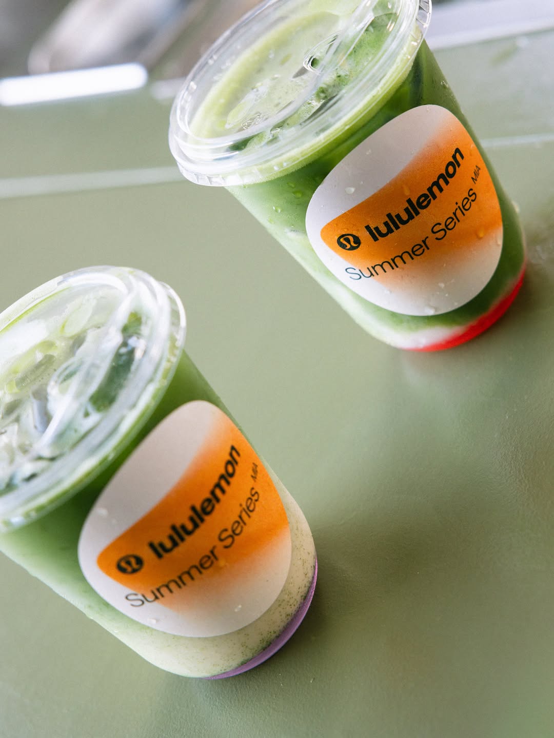 Iced matcha drinks with lululemon Summer Series cup stickers